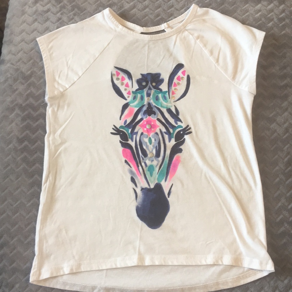 Girls white Gymgo t-shirt with zebra and cut-out.